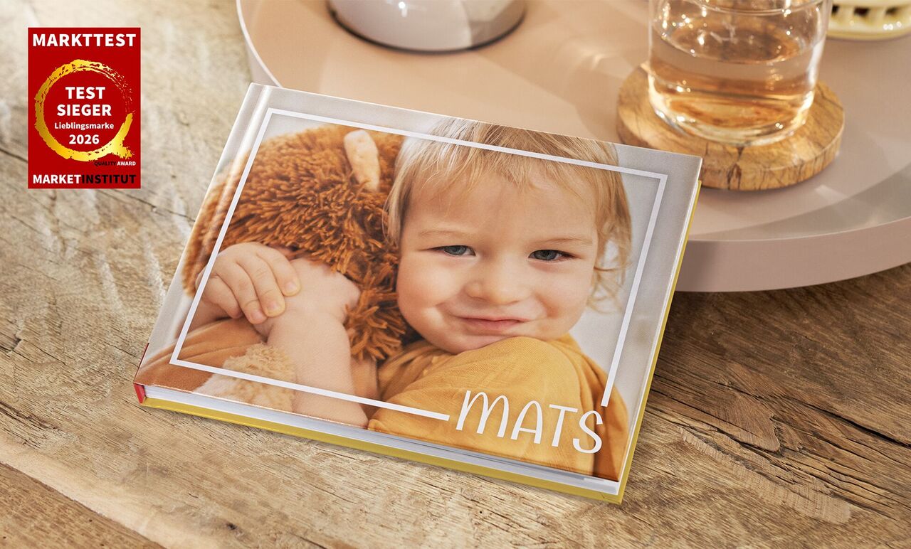 CEWE FOTOBUCH mit Kinderfoto und Namen Mats auf dem Cover