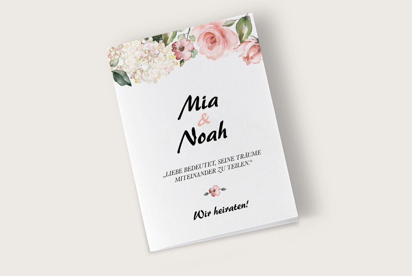 Ein Hochzeitsgrußkarten-Design mit floralen Elementen, das die Namen Mia und Noah zeigt
