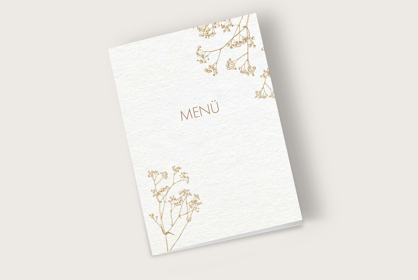 Elegantes Hochzeitsmenü mit goldener Schrift und floralen Akzenten