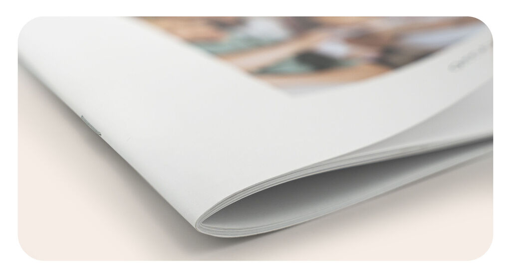 Detailansicht des CEWE FOTOBUCH mit Rückstichbindung als Heft.