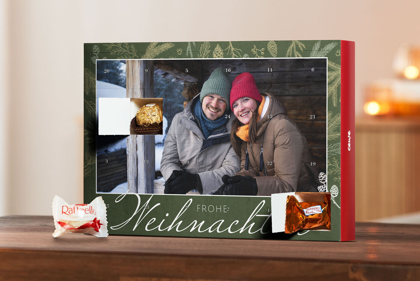 Adventskalender gefüllt mit Ferrero-Pralinen mit dem Foto eines Ehepaares mit einem winterlichen Design